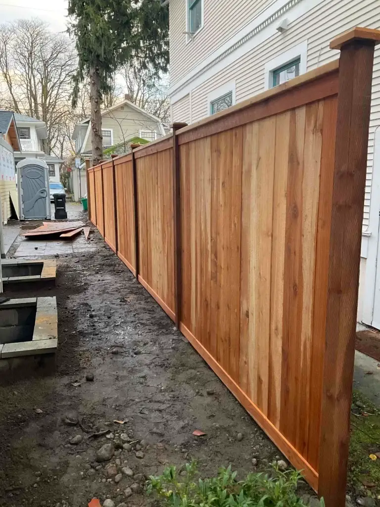 A freshly built Horizontal Cedar Fence in Seattle with clean lines and a sturdy structure.