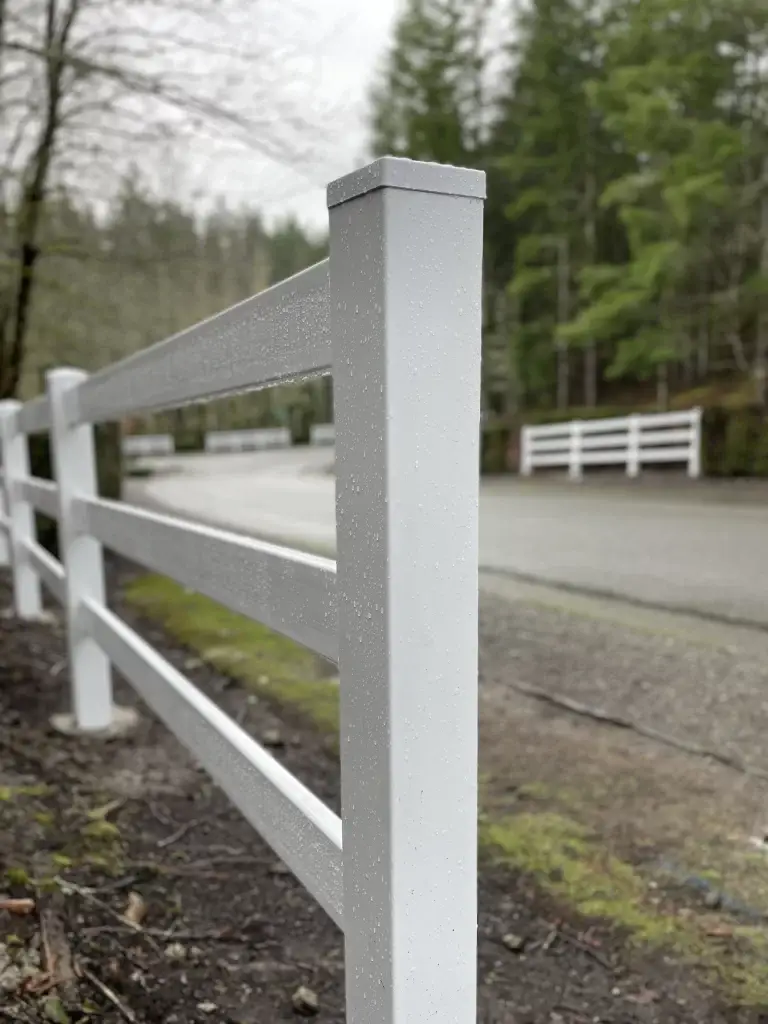 Close-up of a vinyl post and rail fence in Seattle, designed for durability and protection with vinyl fence repair Seattle services.