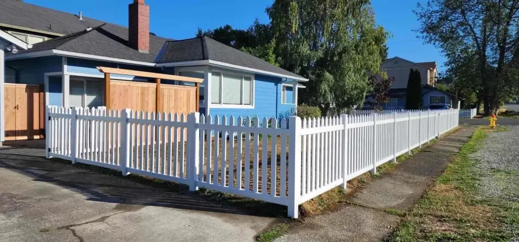 White vinyl fencing enhancing a home's privacy and curb appeal in Seattle.